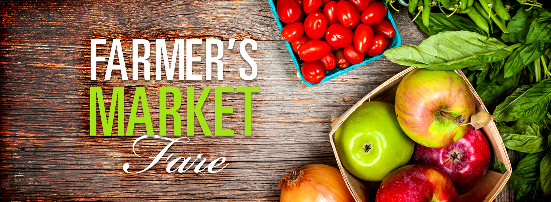 Fruit and vegetables in baskets on wood